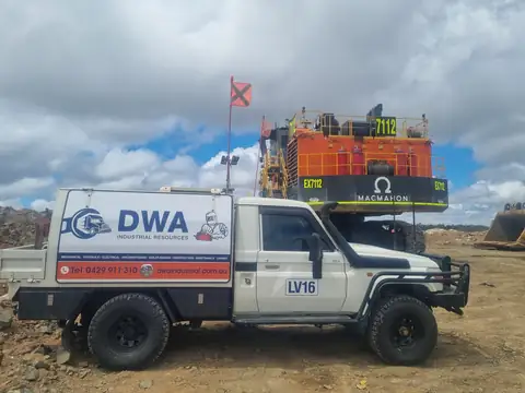 DWA ute on site in front of an excavator