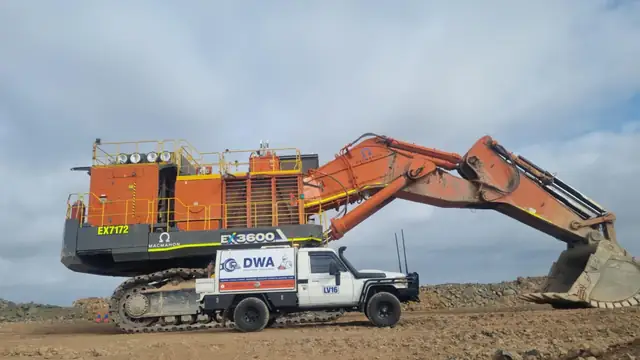 DWA Industrial Resources ute beside an excavator on a Kimberley mine site